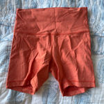 Lululemon  Athletica Women's Coral Orange Winder Train 6 inch Bike Shorts Photo 0