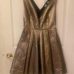 XS Metallic Gold Shimmer Sleeveless V Neck Plunging Neck Cocktail Dress Photo 0