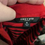 Obey black and red stripe asymmetric hem skirt size medium Photo 3