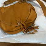 See By Chloe Chloe EUC Tan Crossbody Saddle Bag with Decorative Closure and Tassel Photo 6
