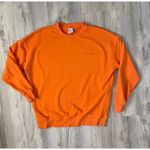 Outdoor Voices  Pickup Sweatshirt in Clementine Photo 1