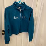 Nike  Women’s 1/3 Zip Hoodie dark green size medium Photo 4