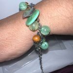 Silver Tone with Green Shimmer Shell Discs Photo 1