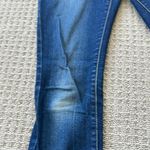 Uniqlo Blue Skinny Jeans with Distressed Hem Photo 1