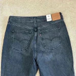 Levi's New with tags Levi’s high rise black 70s high flare jeans in size 34 Photo 15