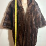 La Martina Women's stylish poncho made of mink fur. $150. Photo 1