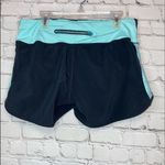 Pearl Izumi Black & Turquoise Athletic Shorts Photo 3