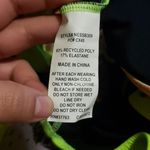 Nike women's medium indigo burst color block cut out one piece swimsuit nwt Photo 4