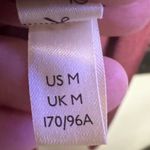 Free People  Intimately long sleeve mauve plunge neck turnt body suit Photo 5