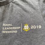 navy blue and white Notre Dame naval ROTC shirt Photo 6