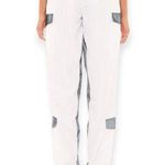 I am gia I.AM.GIA | Small | Halo Pant White Silver Reflective Cargo Parachute Jogger Photo 2