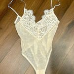 Victoria's Secret Cream Lace Bodysuit Photo 0