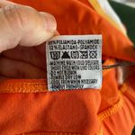 Gigo Active Brazil halter sports bra in orange white and yellow size S small NWT Photo 11