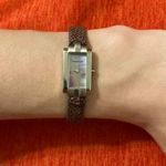 Emporio Armani Woman’s stainless steel mother of pearl dial Swiss Quartzmovement Photo 0