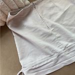 Chic White Mini Skirt with Bow Accents Size M Photo 1