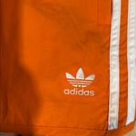 Adidas NWOT  Women's Sprinter Shorts. Size S. Back pocket. Elastic band Photo 5