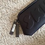 SKIMS  NEW Black Embossed Logo Pouch Photo 2
