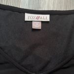 Roz & Ali , 1X black, slight hi-low blouse, stretchy gold detail, adjustable sleeves, pit to pit is 23, hi length is 27, low length is 28 Photo 3