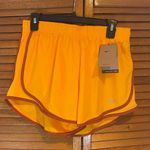 Nike Women’s Dri-Fit Lined Orange Tempo Athletic Shorts Sz M NWT Photo 0