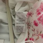 Emily Wonder Long Sleeve Floral Pink and White Romper with Self Photo 5