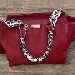 BCBG Paris Satchel Handbag with scarf wrapped strap handles. Red Photo 1