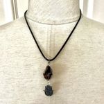 Heat Treated amethyst hamsa charm pendant Photo 2