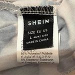 SheIn  Leopard Print Short Sleeve Tee - Black and Gold Photo 1