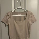 Hollister Cream Colored Scoop Neck Baby Tee Photo 0