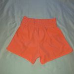 New In Vibrant Coral Athletic Shorts for Women Size Large Orange Photo 1