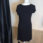 Polly & Esther Boutique purchase from Nashville, TN. Lace up front. Flows, high low hem. Photo 4