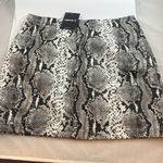 Forever 21 - black/white faux leather snake skin mini skirt! NWT. Size Medium. Photo 1