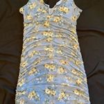 Almost Famous blue body fitting ruched floral strappy dress. Photo 0