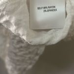 Elegant White Button Photo 3