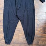 Free People  • Just Because Onesie jumpsuit black knit oversized lounge v neck Photo 9