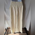Open Edit  | Ivory rayon wide leg smocked waist drawstring palazzo pants Photo 2