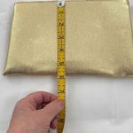 Shimmering Vintage faux leather gold clutch. Photo 3