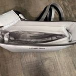 NWT Michael Kors Jet Set Medium Swing Pack Webbed Crossbody Strap color Aluminum White Photo 5