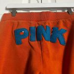 PINK - Victoria's Secret Y2K Victoria's Secret PINK Size M Favorite Sweats Cropped Joggers Logo Orange Photo 8