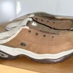 Skechers sport tan suede slip on comfy fleece lined shoes. Photo 0