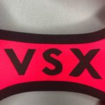 Victoria's Secret Victoria’s Secret VSX Padded Sports Bra in Pink with Black trim. Photo 4
