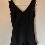 Line and Dot  Cutout Open Back Ruffle Barre Sleeveless V-Neck Black Romper Photo 3