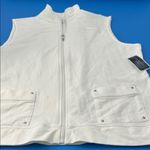 Karen Scott  White Vest Photo 6