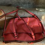 Dana Buchman pink leather purse with handles and shoulder strap. Pockets inside Photo 2