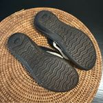 UGG  Brown and Black leather Flip Flops with Button Detail Photo 4