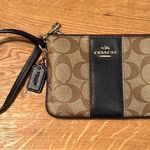 Coach  Tan and Black Wristlet with Gold Accents Photo 0