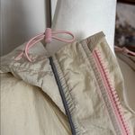 Fabletics Shimmer Hiking Jacket cream windbreaker with Pink Accents raincoat Photo 2