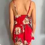 Reverse red floral romper  Photo 1