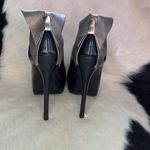 Elle bow on back of the black faux leather platform heels Size 7 M stilettos. Photo 2