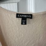 EXPRESS ladies Tank top is a Size XSP. Photo 1