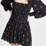 Free People NWT Smocked Floral Celestial Star Black LongSleeve Skater Mini Dress Photo 0